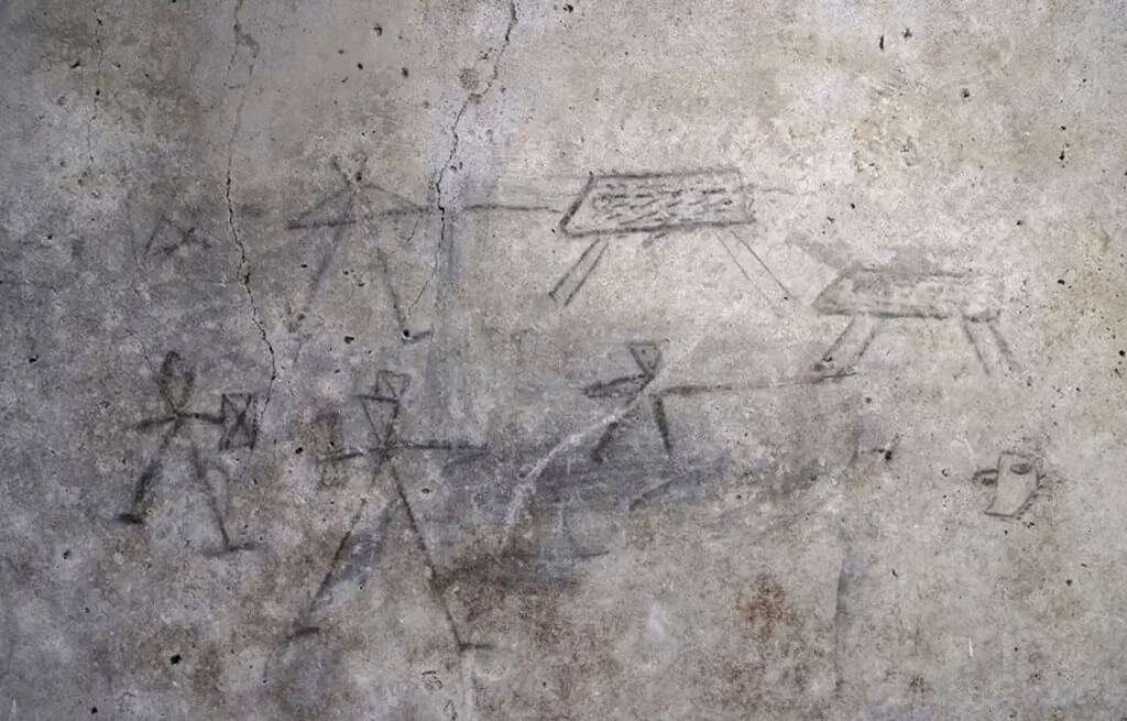 Graffitis d'enfants montrant des scènes de gladiateurs découvertes à Pompéi